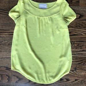 Short sleeve yellow blouse with small puff sleeves
